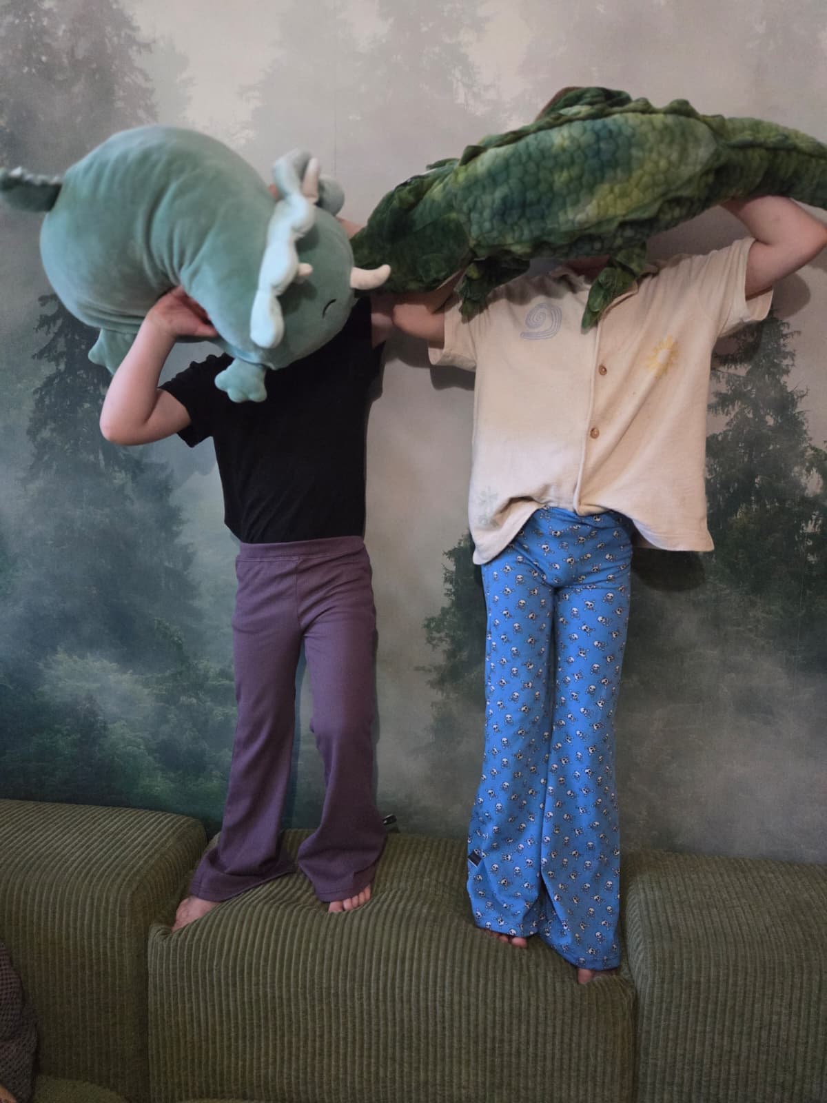 two kids in size 116 and 122 wearing flared pants in different colours, handmade