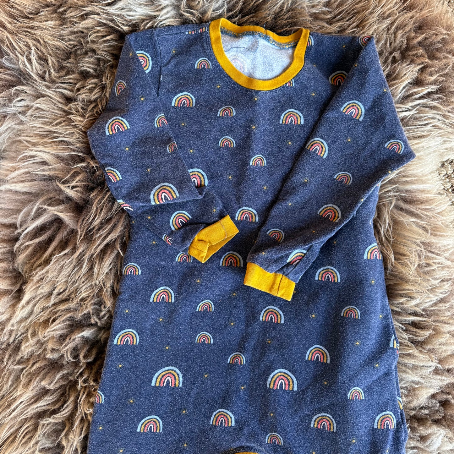 Tweedehands onesie rainbow 98-104
