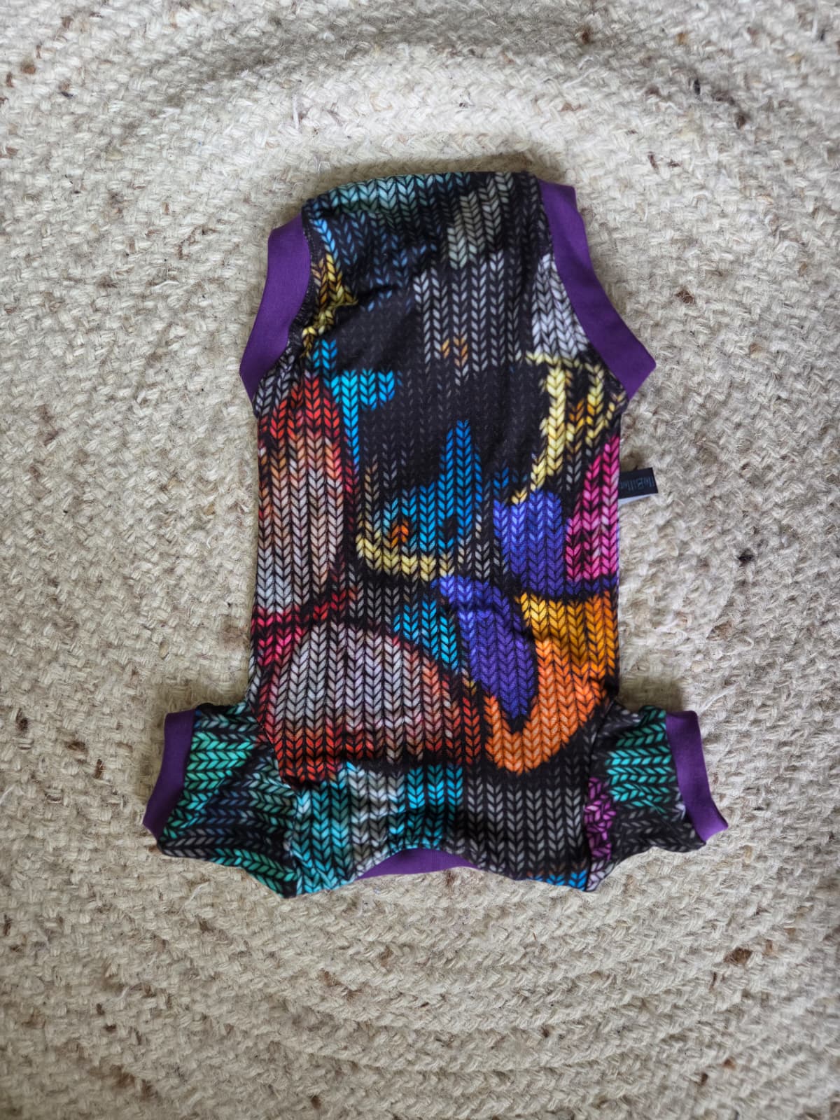 romper in veel kleuren, geschikt voor wasbare luiers. achterkant
